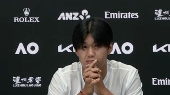 Learner Tien at the Australian Open being interviewed