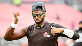 Cleveland Browns quarterback Shedeur Sanders warms up before the game against the San Francisco 49ers at Huntington Bank Field.