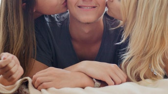 Kansas woman kicked out of throuple