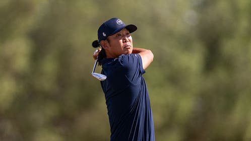 Anthony Kim hitting an iron