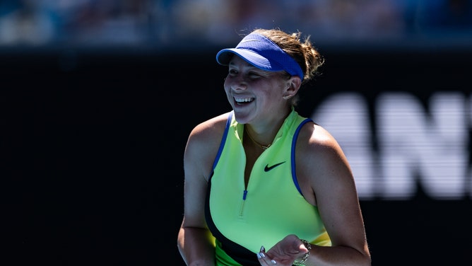 Amanda Anisimova smiling at the Aussie Open