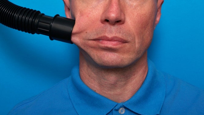 man arrested indecent exposure with vacuum