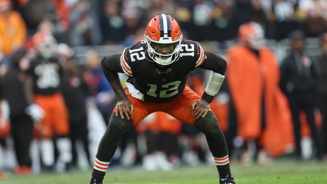 Cleveland Browns quarterback Shedeur Sanders stretches during a time out in the fourth quarter against the Pittsburgh Steelers at Huntington Bank Field.