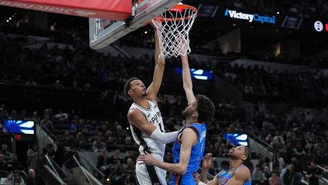 San Antonio Spurs All-Star Victor Wembanyama dunking on Oklahoma City big Chet Holmgren. (Photo credit: Daniel Dunn-Imagn Images)