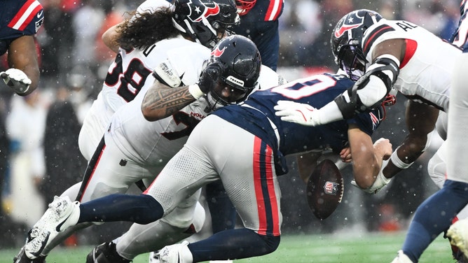 Houston Texans forces a fumble from New England Patriots QB Drake Maye in the AFC Divisional Round. (Photo Credit: Brian Fluharty-Imagn Images)