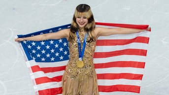 Gold medallist USA's Alysa Liu poses with her medal following the victory ceremony of the figure skating women's single free skating final during the Milano Cortina 2026 Winter Olympic Games at Milano Ice Skating Arena in Milan on February 19, 2026.
