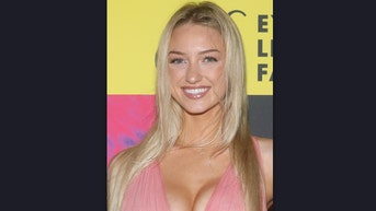 Sydney Thomas at Super Bowl party with Livvy Dunne