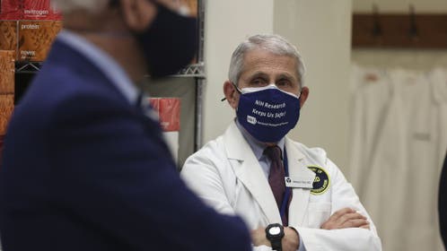 Anthony Fauci and Joe Biden wearing masks