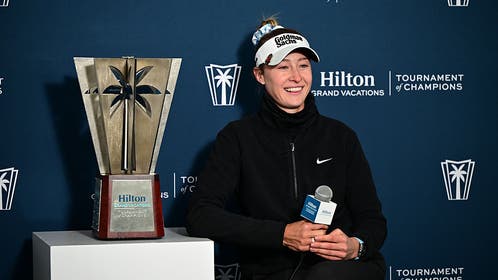 Nelly Korda with TOC trophy in Orlando