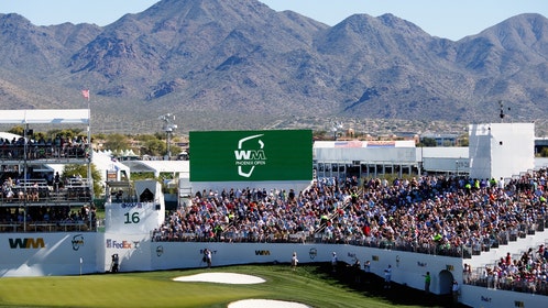 Woman in green dress kisses another woman and chugs beer