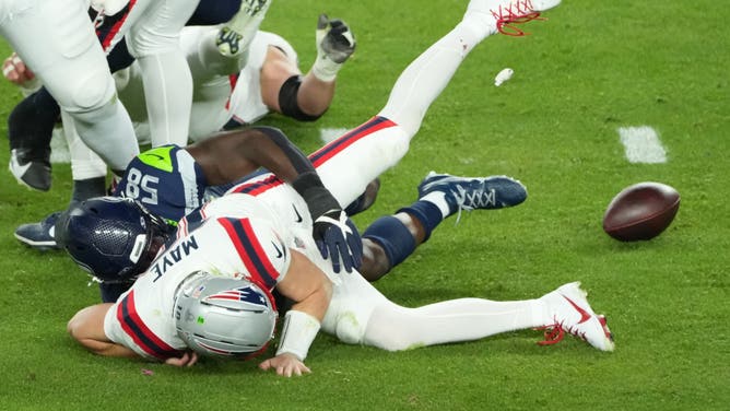 New England Patriots QB Drake Maye gets sacked by the Seattle Seahawks in Super Bowl LX at Levi's Stadium in Santa Clara, California. (Photo credit: Kirby Lee-Imagn Images)