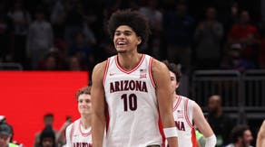 Arizona Wildcats forward Koa Peat (10) reacts after defeating the Houston Cougars during the men's Big 12 Conference Tournament Championship at T-Mobile Center.