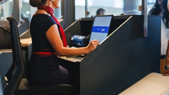 Airline employee bought boob job while helping smuggle cash to Dubai