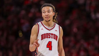 Houston Cougars guard Kingston Flemings (4) reacts while playing against the Baylor Bears in the second half at Fertitta Center. Mandatory Credit: