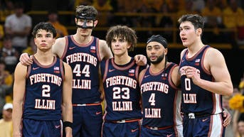 Illinois Fighting Illini guard Andrej Stojakovic, center Zvonimir Ivisic, guard Keaton Wagler, guard Kylan Boswell and forward David Mirkovic on the court during a game against the Iowa Hawkeyes at Carver-Hawkeye Arena.