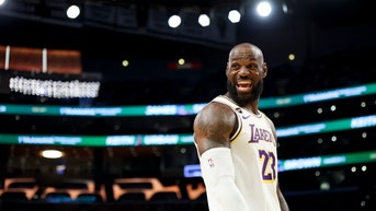 LeBron James laughing on the court
