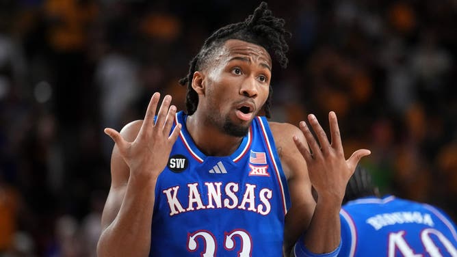 Kansas Jayhawks guard Darryn Peterson (22) looks to the referee after getting a foul called against him as they play the ASU Sun Devils at Desert Financial Arena in Tempe on March 3, 2026.