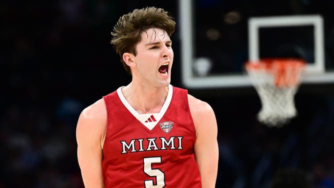 Miami (Oh) Redhawks guard Peter Suder (5) celebrates after hitting a three point basket against the Akron Zips during the first half of the MAC Conference Tournament Championship game at Rocket Arena. Mandatory Credit: 