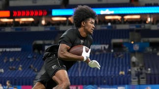 Texas A&M wideout KC Concepcion doing a drill during the 2026 NFL Scouting Combine at Lucas Oil Stadium.