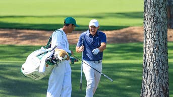 Rory McIlroy and caddie, Harry Diamond, at Augusta National