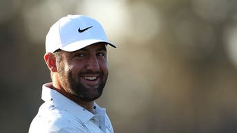 Scottie Scheffler smiling at TPC Sawgrass