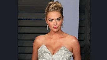 Kate Upton blue and orange bikini Tigers home opener Sports Illustrated Swimsuit