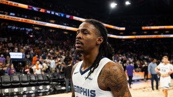 Ja Morant walks off the court for the Memphis Grizzlies.