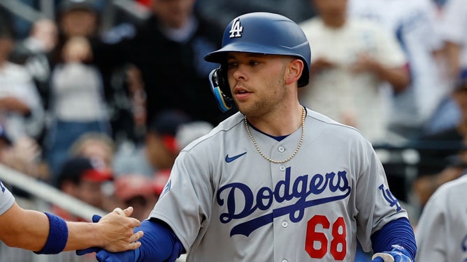Los Angeles Dodgers catcher Dalton Rushing celebrates after hitting a two run home run against the Washington Nationals during a game at Nationals Park.